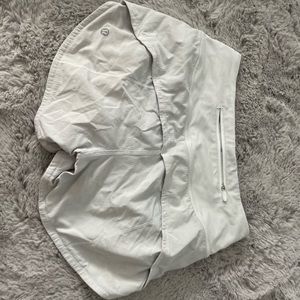 white lululemon 4’ shorts